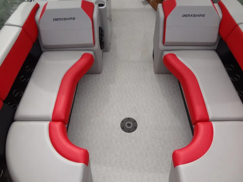 Slide: The Image of 2023 Berkshire 25UL STS 3.0+ boat interior with red and gray seating. - 12