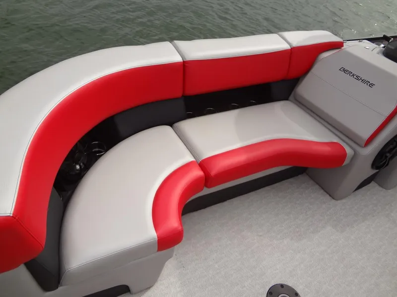 Slide: The Image of 2023 Berkshire 25UL STS 3.0+ boat seating with red and gray upholstery. - 13