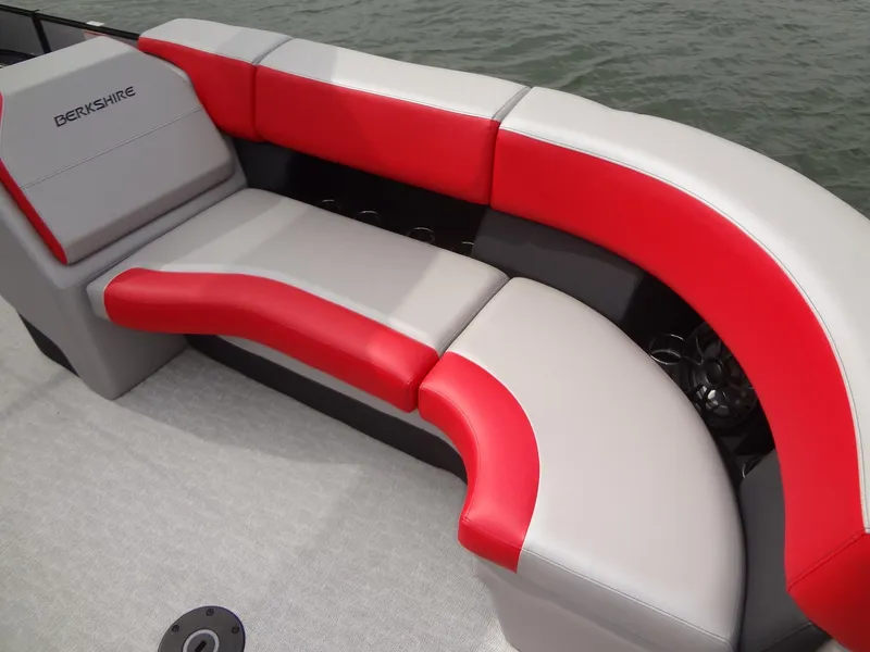 Slide: The Image of 2023 Berkshire 25UL STS 3.0+ boat seating with red and gray upholstery. - 14