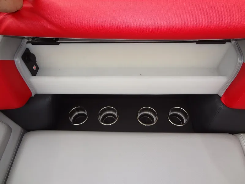 Slide: The Image of 2023 Berkshire 25UL STS 3.0+ boat interior with red upholstery and cup holders. - 15