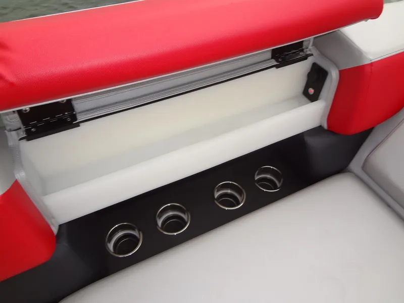 Slide: The Image of 2023 Berkshire 25UL STS 3.0+ boat seating with red upholstery and cup holders. - 16