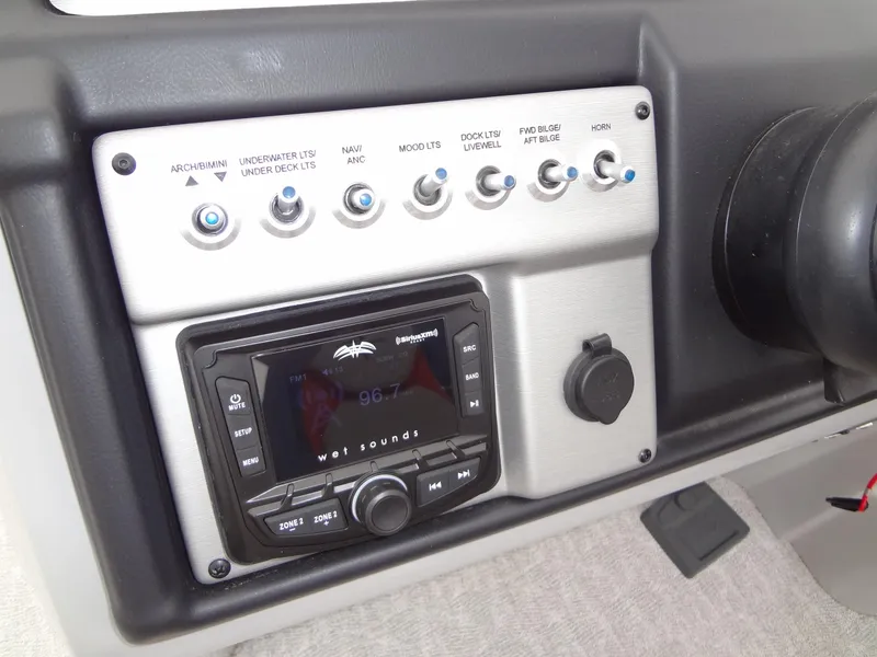 Slide: The Image of Control panel of 2023 Berkshire 25UL STS 3.0+ with audio system and switches. - 23