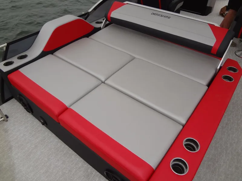 Slide: The Image of 2023 Berkshire 25UL STS 3.0+ boat seating, red and gray upholstery, cup holders. - 28
