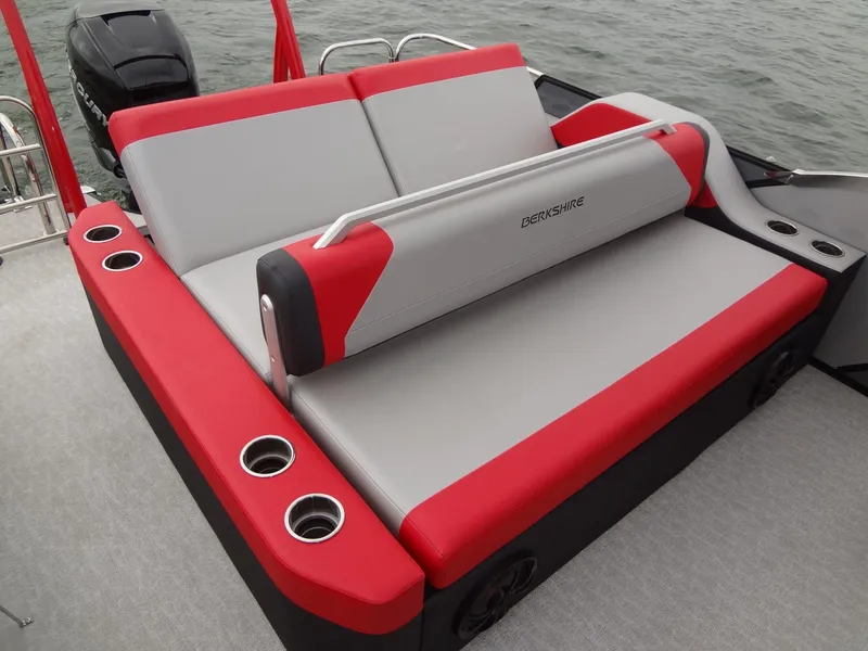 Slide: The Image of 2023 Berkshire 25UL STS 3.0+ boat seating with red and gray upholstery. - 31