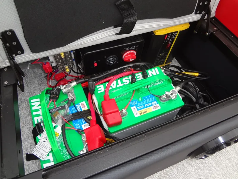Slide: The Image of Battery compartment of 2023 Berkshire 25UL STS 3.0+ with Interstate batteries and wiring. - 38