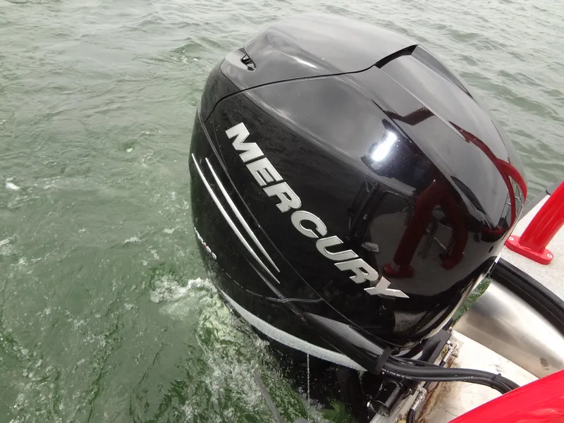 Slide: The Image of Mercury outboard motor on 2023 Berkshire 25UL STS 3.0+ boat in water. - 39