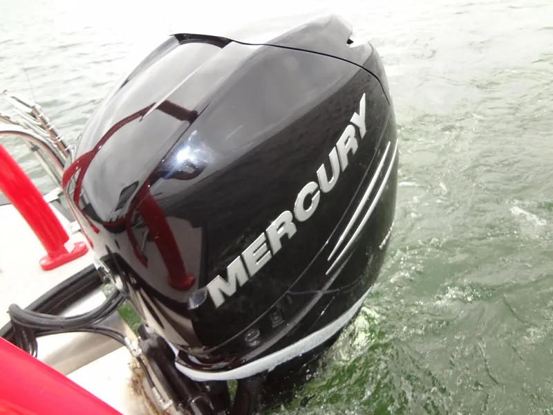 Slide: The Image of Mercury outboard motor on 2023 Berkshire 25UL STS 3.0+ boat in water. - 40