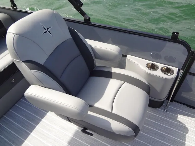 Slide: The Image of 2023 Berkshire 24UL CTS 3.0 boat seat with cup holders, on water. - 15
