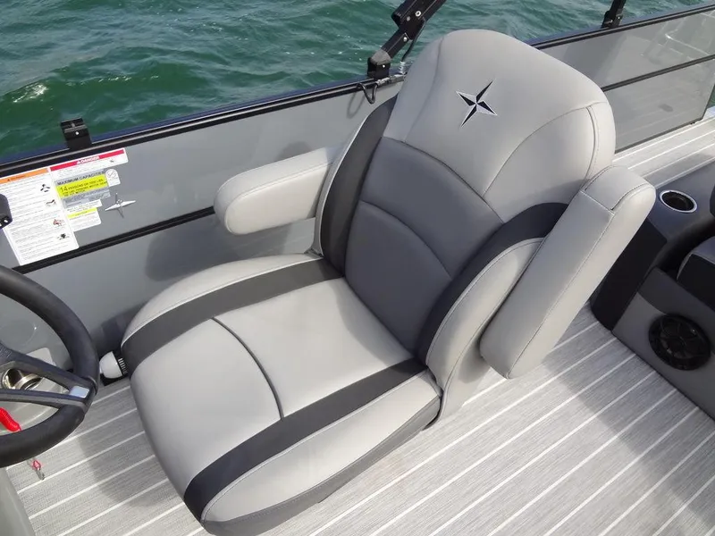 Slide: The Image of 2023 Berkshire 24UL CTS 3.0 boat seat, gray upholstery, on water. - 17
