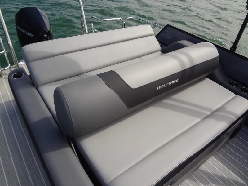 Slide: The Image of 2023 Berkshire 24UL CTS 3.0 boat with luxurious gray seating on deck. - 25