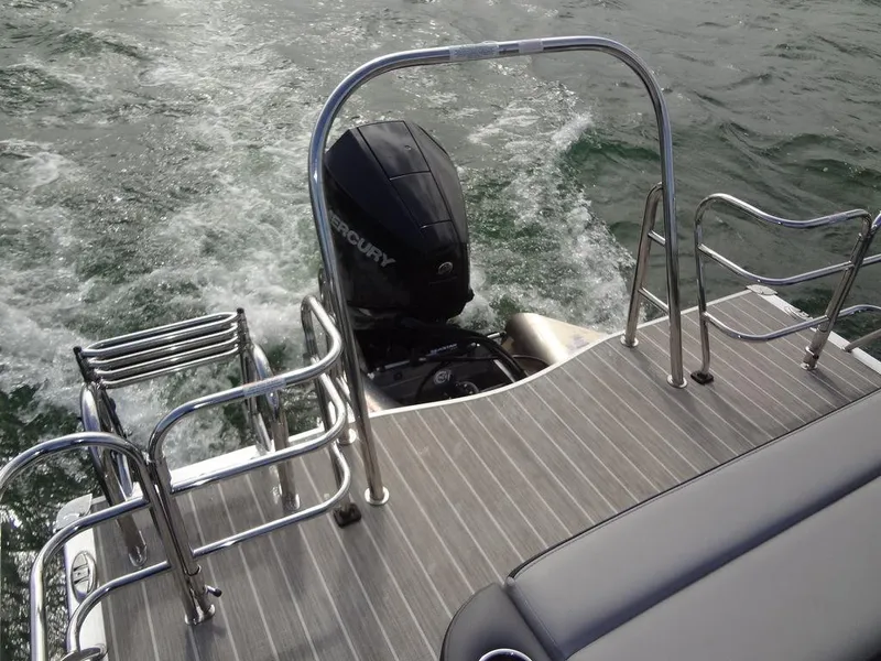 Slide: The Image of 2023 Berkshire 24UL CTS 3.0 boat with Mercury outboard motor on water. - 28