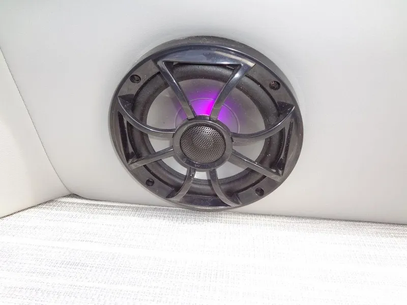 Slide: The Image of Speaker with purple LED light in 2023 Berkshire 24UL CTS 3.0 boat interior. - 30