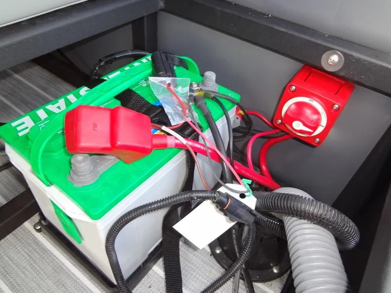 Slide: The Image of Battery compartment of 2023 Berkshire 24UL CTS 3.0 with wiring and switch. - 32