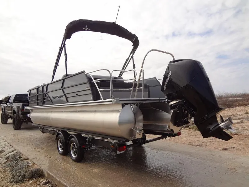 Slide: The Image of 2023 Berkshire 24UL CTS 3.0 pontoon boat on trailer, rear view. - 36