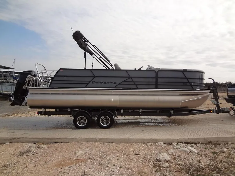 Slide: The Image of 2023 Berkshire 24UL CTS 3.0 pontoon boat on trailer, side view. - 40