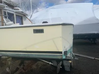 Slide: The Image of 1975 Chris-Craft 30 Tournament FB boat in dry dock, side view. - 2