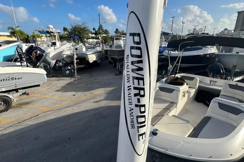 Slide: The Image of Boats docked with Power-Pole anchor, Piranha B2200 CASADOR 2023. - 14