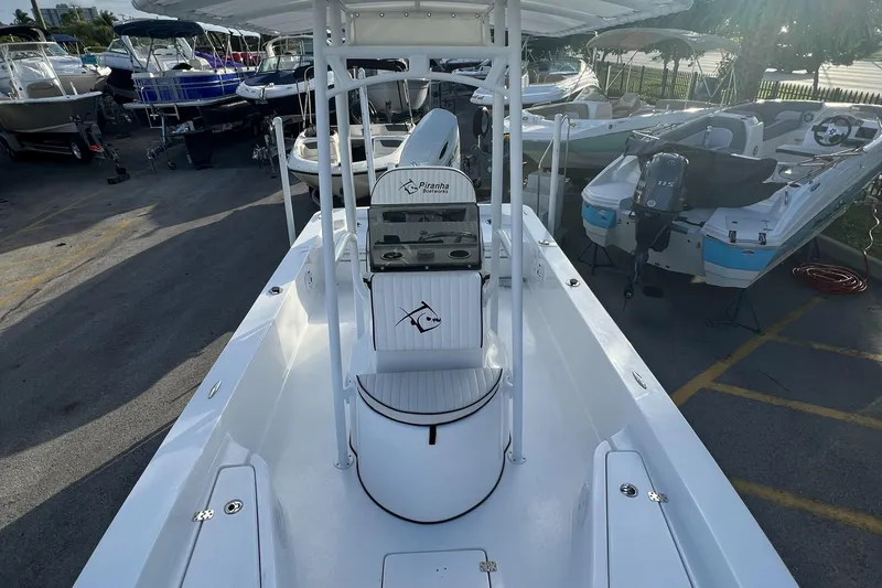 Slide: The Image of Piranha B2200 CASADOR 2023 boat on a parking lot. - 3