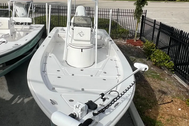 Slide: The Image of 2023 Piranha B2200 CASADOR boat displayed in parking lot. - 39