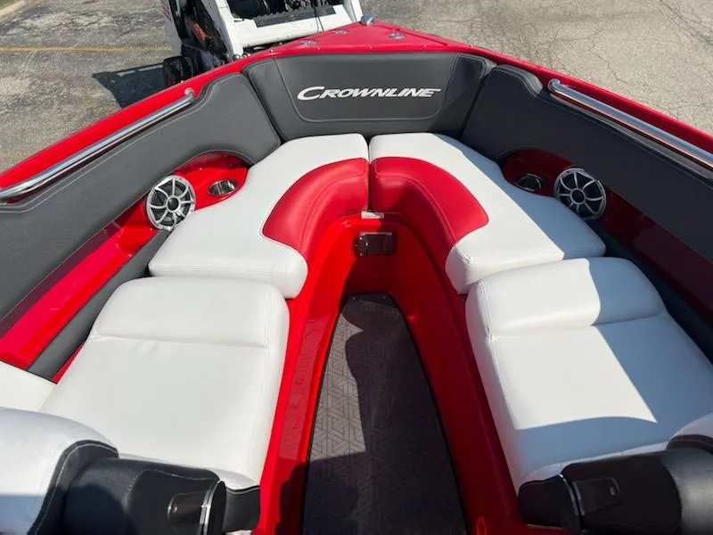 Slide: The Image of 2023 Crownline 240 SS boat interior with red and white seating. - 3