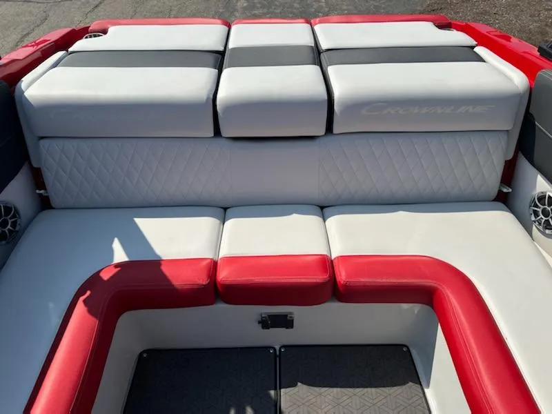 Slide: The Image of 2023 Crownline 240 SS boat interior with red and white seating. - 5