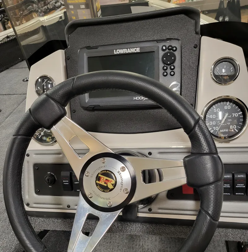 Slide: The Image of 2023 Ranger VS1682SC Angler boat interior with Mercury engine and seating. - 8