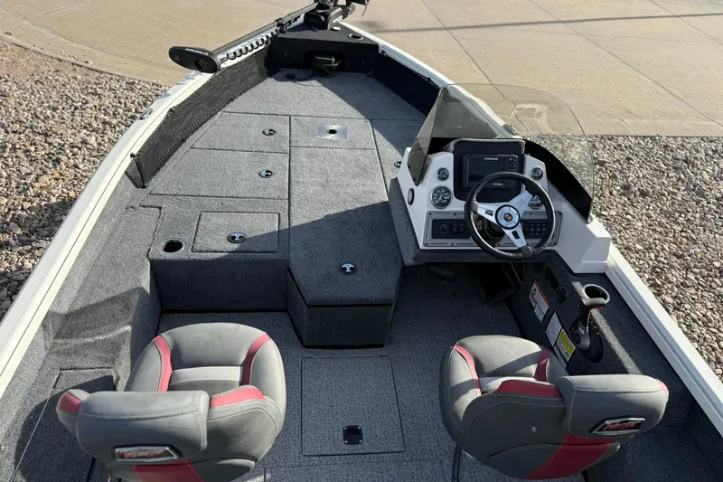 Slide: The Image of 2023 Ranger VS1682SC Angler boat interior with steering console and seating. - 9