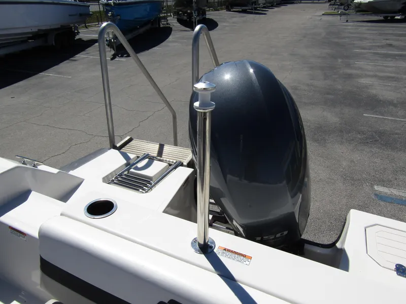 Slide: The Image of 2023 Starcraft SVX 190 OB boat with outboard motor and swim ladder. - 32