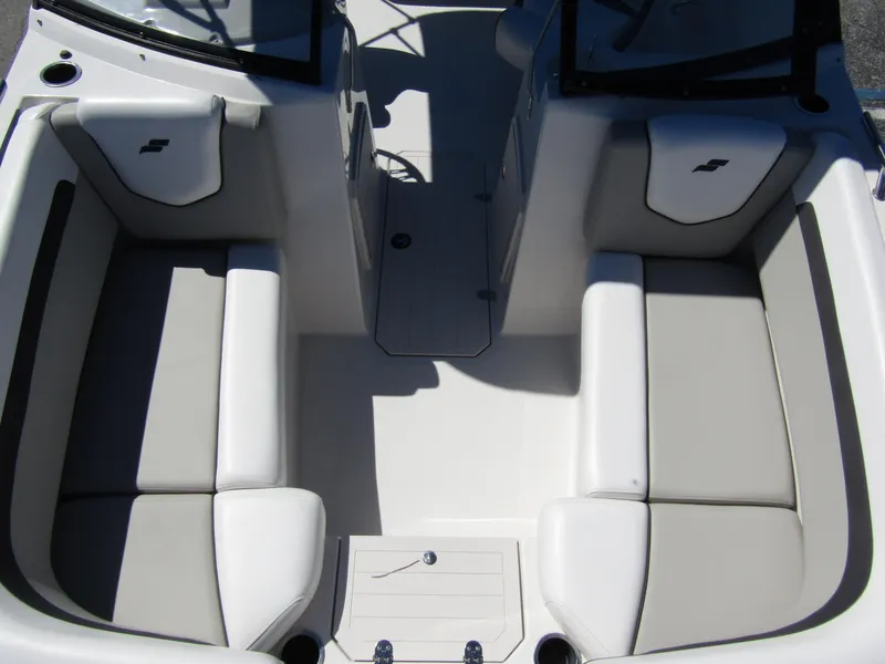 Slide: The Image of 2023 Starcraft SVX 190 OB boat interior with cushioned seating and modern design. - 9