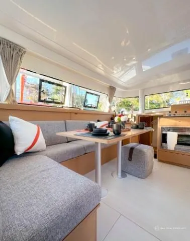 Slide: The Image of Modern interior of 2024 Excess 11 yacht with dining area and kitchen. - 21