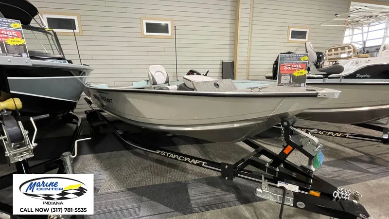 Slide: The Image of 2023 Starcraft Angler Patriot 16 TL boat displayed at Marine Center Indiana. - 5