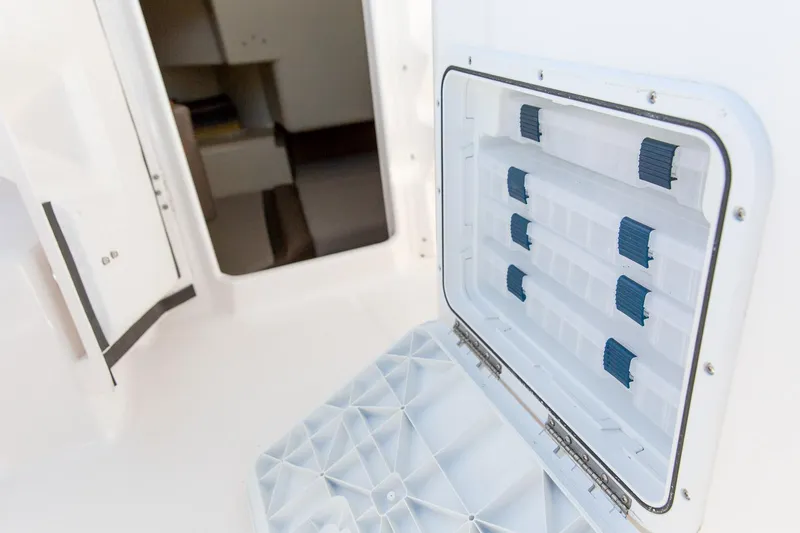 Slide: The Image of 2023 Solara S-250 CW storage compartment with open hatch. - 17
