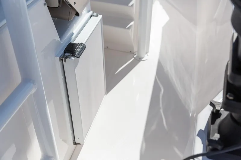 Slide: The Image of 2023 Solara S-250 CW boat interior with storage compartment. - 19