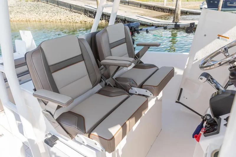 Slide: The Image of 2023 Solara S-250 CW boat seats with armrests and modern design. - 8