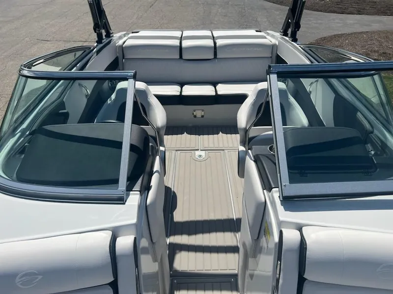 Slide: The Image of 2023 Crownline 240 SS SURF boat interior with open bow seating. - 2