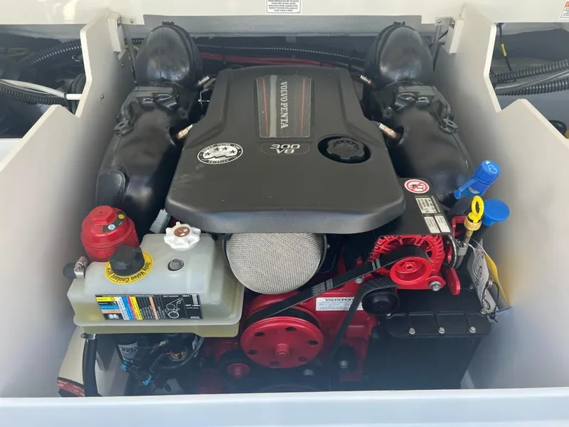 Slide: The Image of 2023 Crownline 240 SS SURF boat engine compartment with Volvo Penta V8 engine. - 6