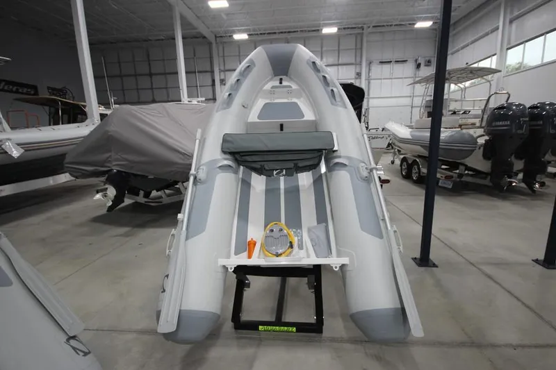 The Image of 2023 Zodiac Cadet 390 DL RIB ALU PVC boat in showroom, front view. - 0