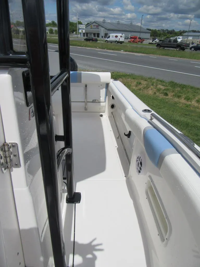 Slide: The Image of 2023 Robalo R222 Center Console boat interior view. - 10