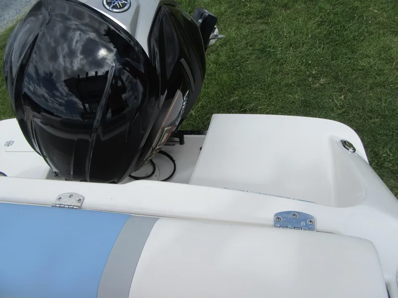 Slide: The Image of 2023 Robalo R222 Center Console boat with Yamaha outboard motor. - 21