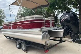 Slide: The Image of 2023 Sun Tracker Party Barge 22 RF XP3 pontoon boat with Mercury engine on trailer. - 12