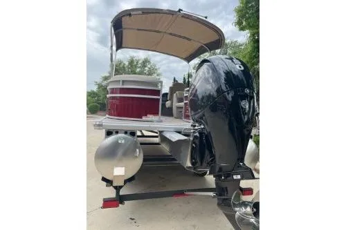 Slide: The Image of 2023 Sun Tracker Party Barge 22 RF XP3 pontoon boat with canopy and powerful outboard motor. - 11