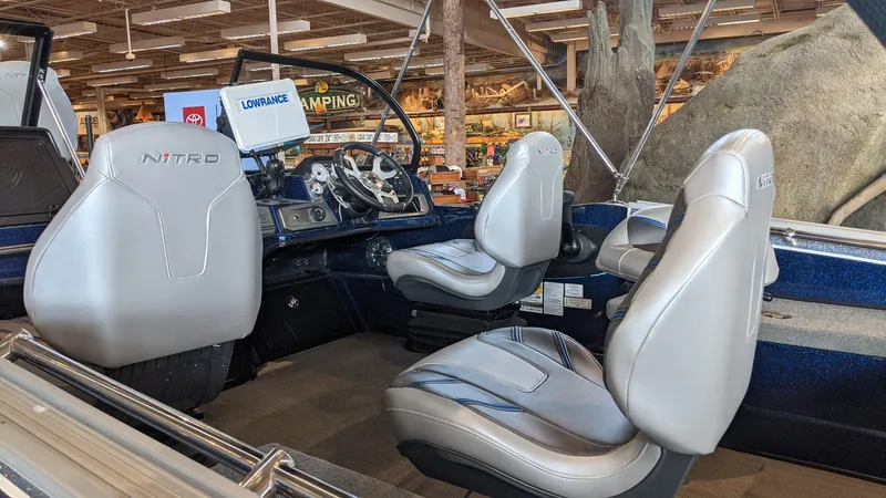 Slide: The Image of Interior of 2023 Nitro ZV20 Pro boat with steering console and seating. - 3