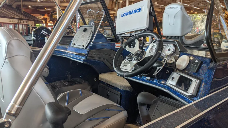 Slide: The Image of 2023 Nitro ZV20 Pro boat interior with Lowrance electronics and modern dashboard. - 4