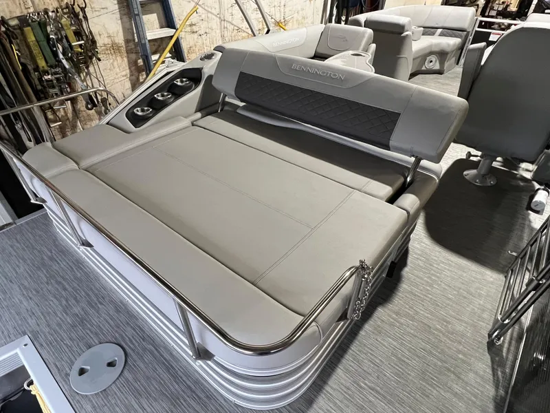 Slide: The Image of 2023 Bennington 22SXSB pontoon boat with spacious seating and modern design. - 14