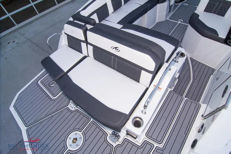 Slide: The Image of 2023 Monterey M6 boat with stylish seating and deck design. - 16