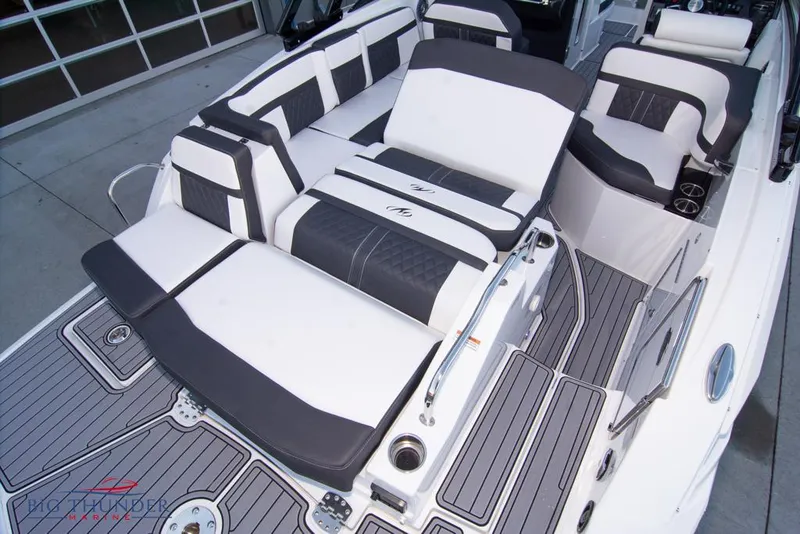 Slide: The Image of 2023 Monterey M6 boat interior with luxurious seating and modern design. - 17