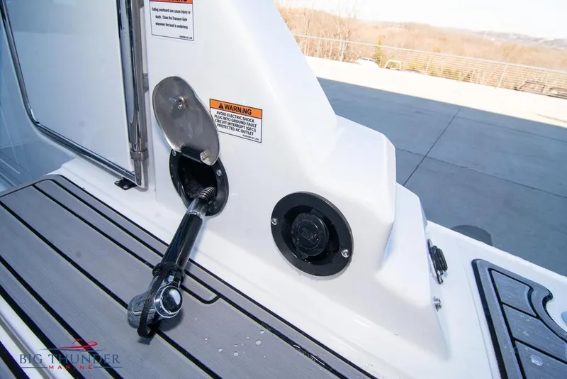 Slide: The Image of 2023 Monterey M6 boat fuel inlet and deck area. - 19