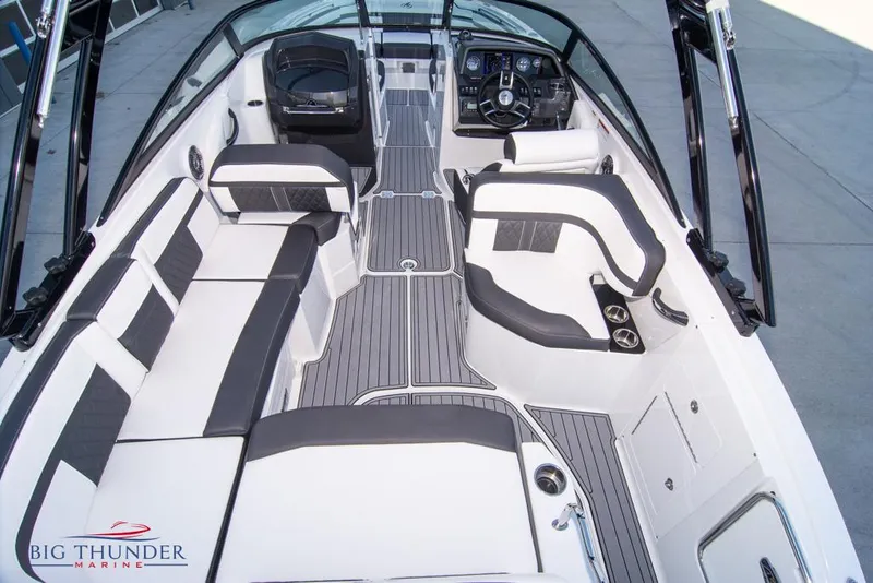 Slide: The Image of 2023 Monterey M6 boat interior with luxurious seating and modern dashboard. - 22