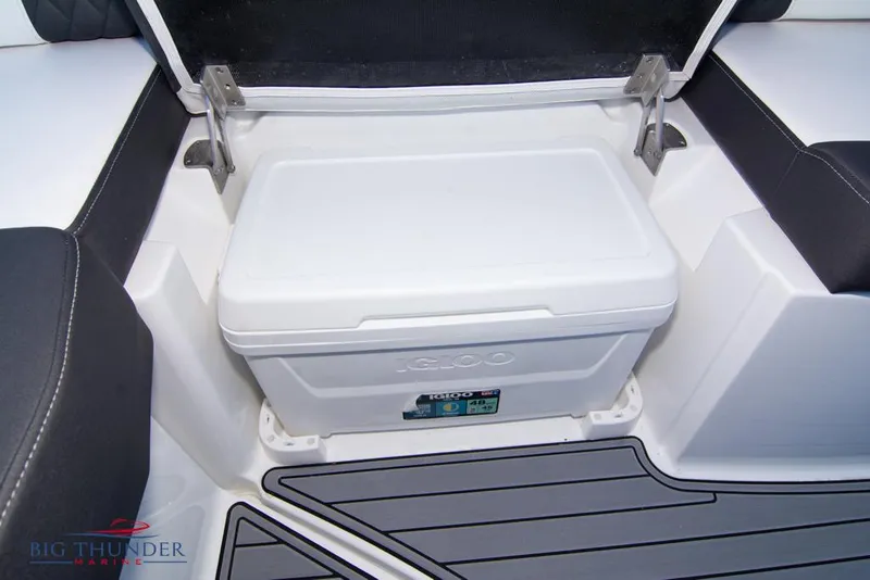 Slide: The Image of 2023 Monterey M6 boat with built-in cooler storage compartment. - 30