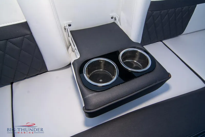 Slide: The Image of 2023 Monterey M6 boat interior with foldable cup holders. - 31